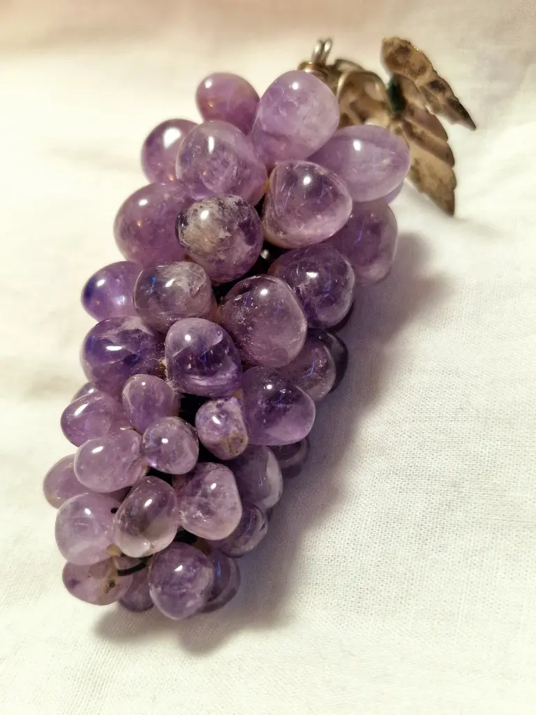 vintage Amethyst grapes. bunch stone grapes. polished stone. wired with vine leaf.
