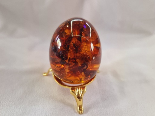 russian pressed amber egg on stand 73 .3 g