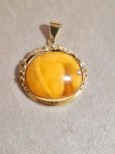 Antique Baltic amber pendent 
925 sterling silver with gold plating